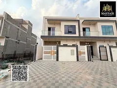Townhouse for sale in Al Helio 2. Registration and ownership fees included. Next to mosque, prime lo