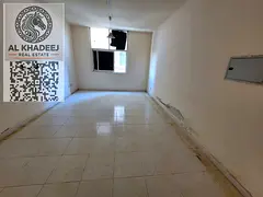 A spacious studio apartment currently under renovation in Al Rashidiya 3 next to Grand Mall A prime