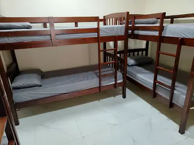 Premium Men Hostel near Sharaf DG Metro