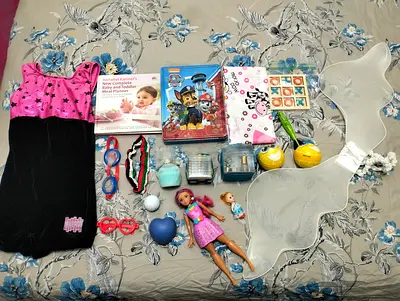 All for 10 AED only Kids girls clothes and some toys Location Al barsha 1