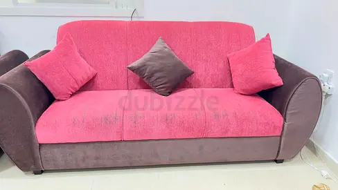 Comfortable Pink and Brown Sofa with Cushions