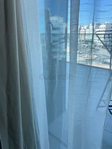 Elegant Sheer Curtains for a Light-Filled Space