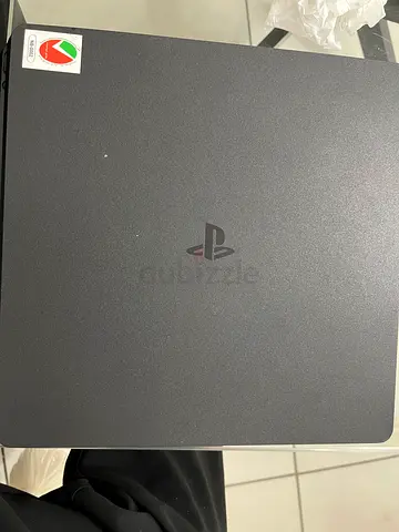 Sony ps4 for sale with games , 2 controllers and a dual charger
