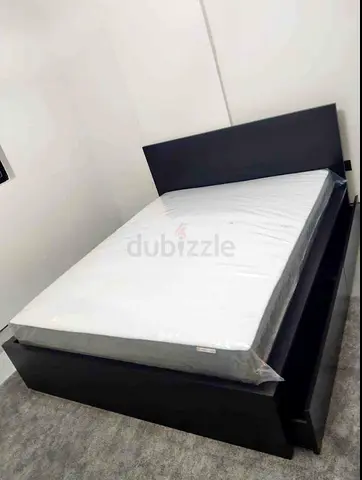 IKEA malam king‑size bed (180 × 200 cm) with 2 storage drawers underneath and an IKEA mattress