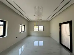 For sale first-inhabitant villa in Al-Hoshi with luxurious finishes and a prime location.