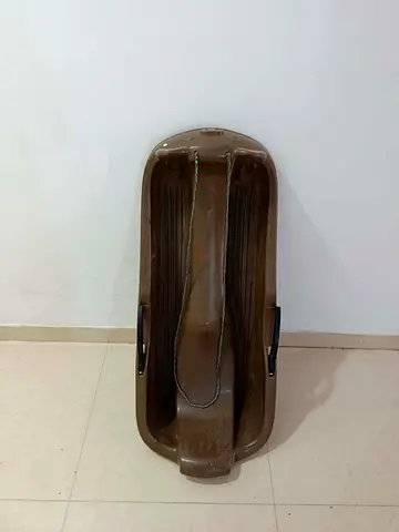 Sand surfing board