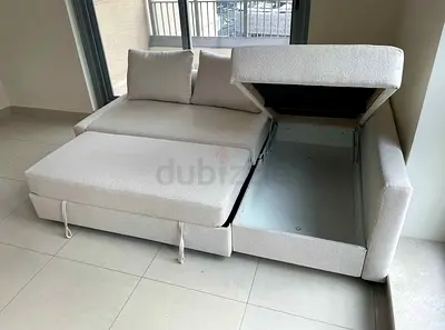 Ikea L Shape Sofa cum bed with big storage in L