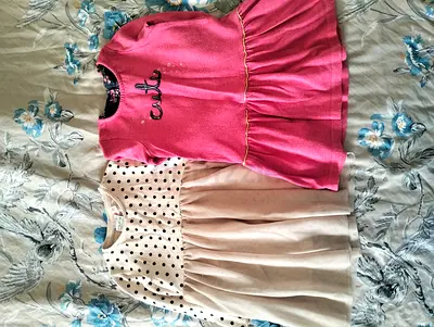 Both for 20 AED only Branded Kids clothes for girls 1-2 years old in perfect condition