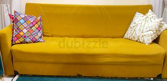 Comfortable Yellow Sofa cum bed with storage