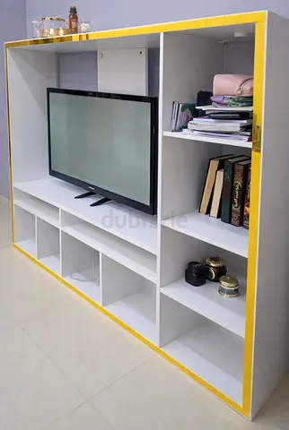 Modern White Entertainment Center with Yellow Accents