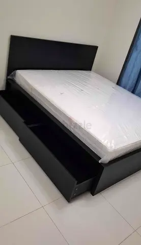 IKEA malam queen‑size bed (160 × 200 cm) with 2 storage drawers underneath and an IKEA mattress