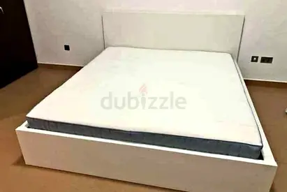 IKEA malam king‑size bed (180 × 200 cm) with 2 storage drawers underneath and an IKEA mattress