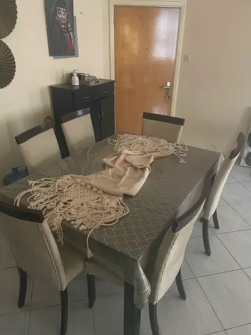 Classic wooden table with six chairs