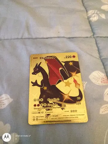 Gold edition basic Charizard Pokemon card