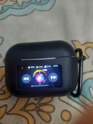 Compact Black airpods with display and all the features controlling