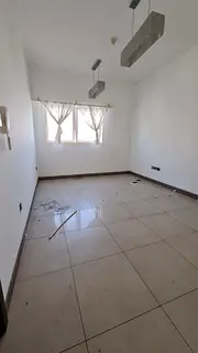 1BR hall apartment in Al Qasimiya, family only, rent 35,000 AED, 4 or 6 installments, gym &amp; pool