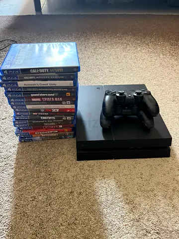 PlayStation 4 in great condition with 2 controllers (1 with minor fault) + 17 games