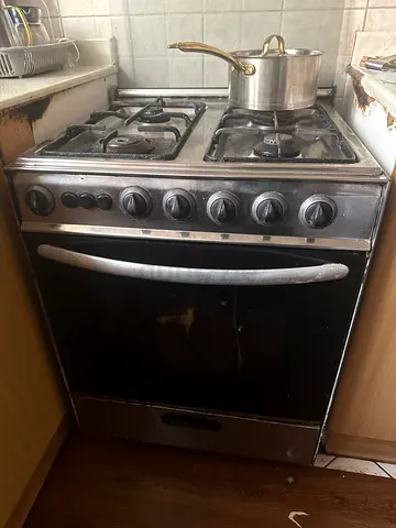 Used 4 burner gas stove for quick sale