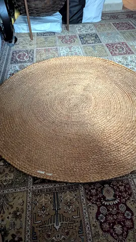 Handcrafted Round Natural Fiber Area Rug