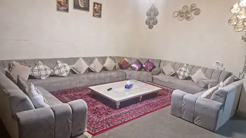 Beautiful Corner Sofa Set with Elegant Rug