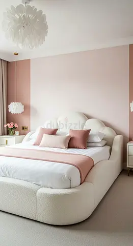 Elegant White Upholstered Bed with Soft Finish