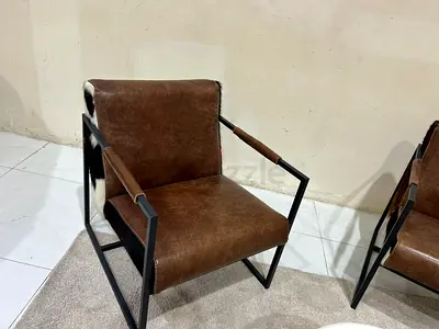Selling high quality Marina Home leather chairs with coffee table