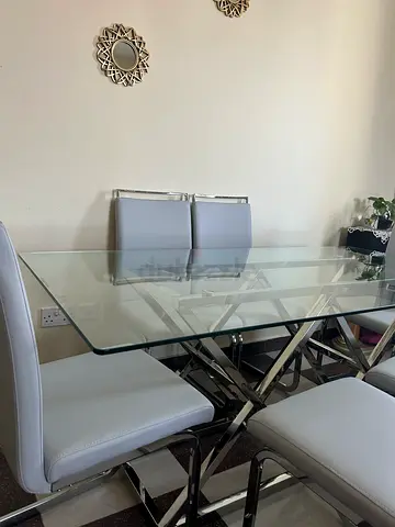 Stylish Glass Dining Table with Elegant Chairs brand new just bought one week