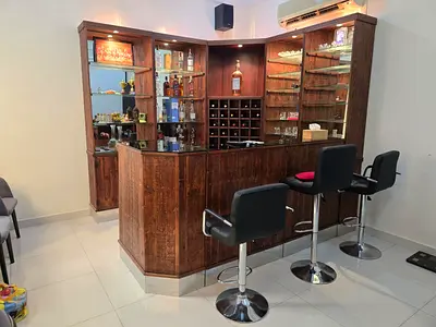 Stylish Wooden Bar Counter with High Stools