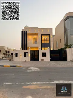 A luxurious corner villa on two streets, featuring a modern design, high-end finishes, and a garden,