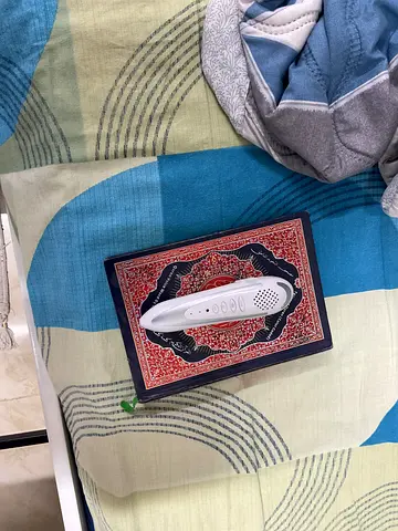 Quran with reading pen