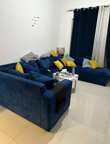 Cozy Blue Fabric Sofa Set with Colorful Cushions