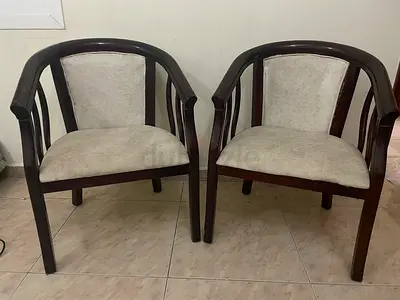 2 solid wooden chairs