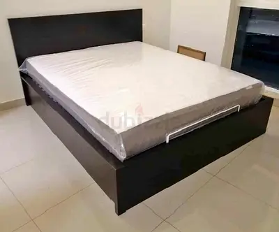 Ikea hydraulic queen size bed frame with storage inside full bed and with Ikea pocket sprung  mattre