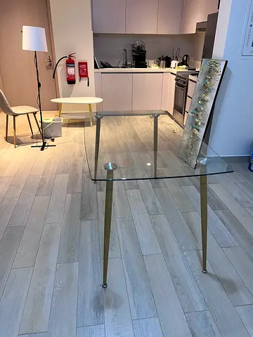 Stylish Glass Dining Table with Gold Legs