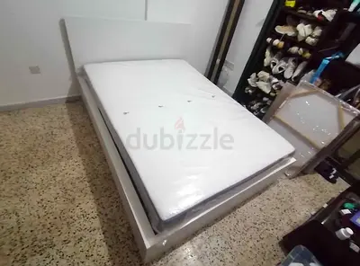 IKEA malam queen‑size bed (160 × 200 cm) with 2 storage drawers underneath and an IKEA mattress