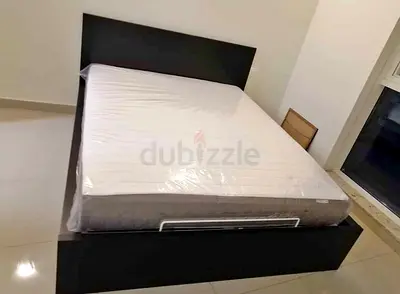 IKEA hydraulic queen‑size bed (160 × 200 cm) with  IKEA mattress
