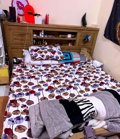 Comfortable Wooden Bed with Stylish Bedding
