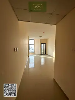 Own an apartment in the heart of Ajman with an open view. Two bedrooms and a living room, ready to m