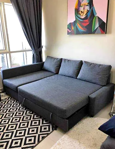Ikea L Shape Sofa cum bed with big storage in L