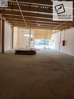 For rent in Al Jurf Industrial Area, a warehouse with an area of ​​3,000 square feet including a