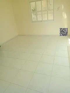 Villa with 5 bedrooms and a hall for annual rent in Al Muwaihat, priced at 110,000