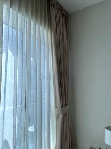 Elegant and Light Cream Curtains for a Modern Home