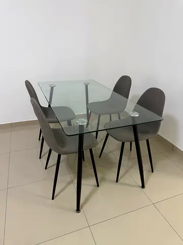 Modern Glass Top Dining Table with Stylish Chairs