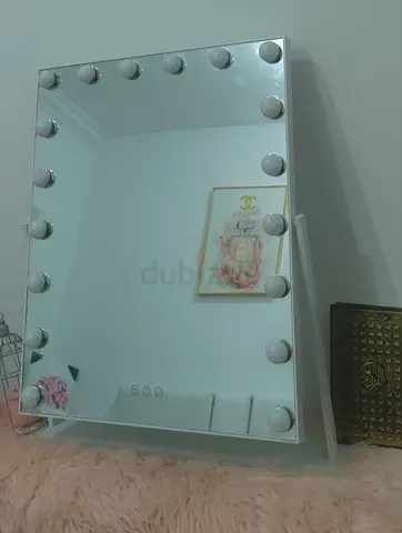 Mirror with changing light