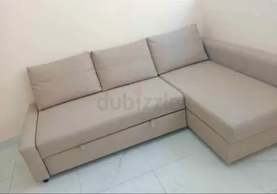 Ikea L Shape Sofa cum bed with big storage in L