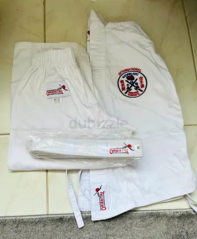 Karate suit with white belt