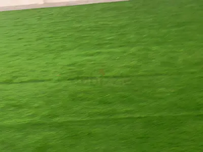 Vibrant Green Artificial Grass Carpet - Perfect for Indoor or Outdoor Use!