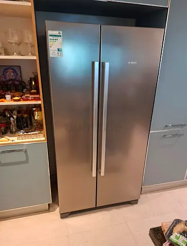 Bosch side by side fridge freezer excellent condition perfect working