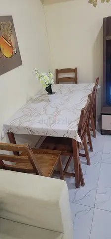 Elegant Solid Wood Dining Table with Chairs