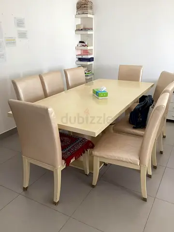 Elegant Dining Table Set with Cream Chairs